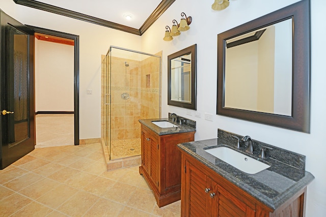 bathroom with vanity, tile patterned flooring, ornamental molding, and walk in shower