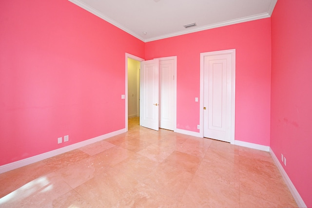 unfurnished bedroom featuring crown molding