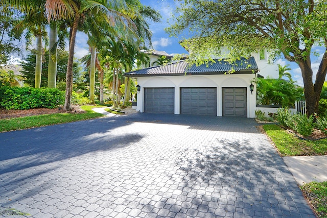 exterior space with a garage