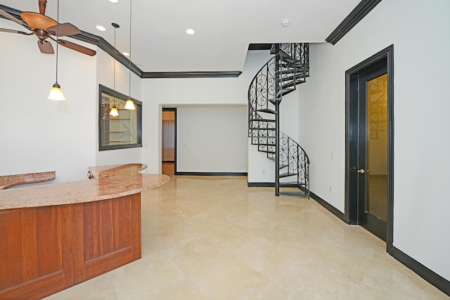 interior space featuring crown molding and ceiling fan