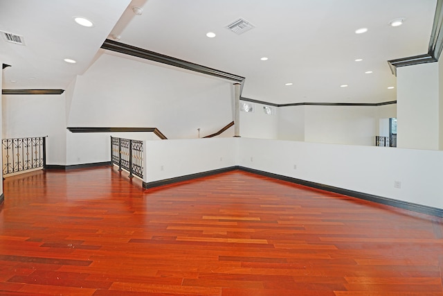 empty room featuring wood-type flooring