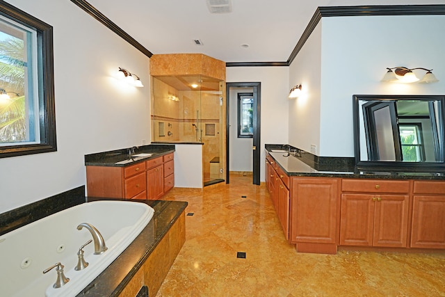 bathroom with vanity, crown molding, and shower with separate bathtub