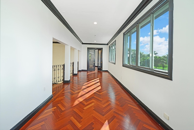 corridor featuring crown molding and parquet floors