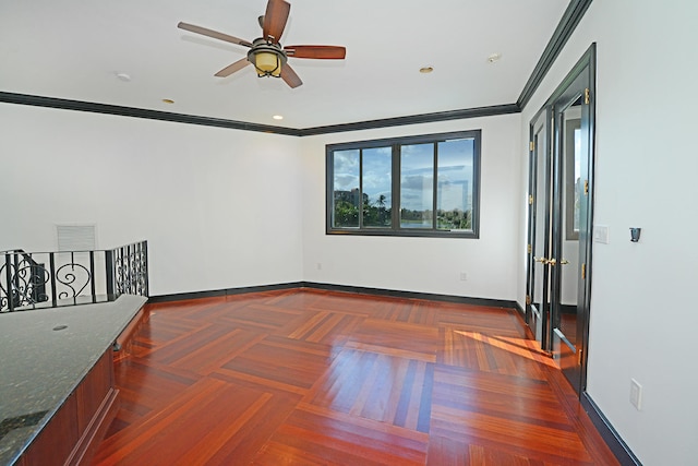 unfurnished room featuring crown molding, dark parquet flooring, and ceiling fan