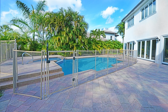 view of pool featuring a patio area