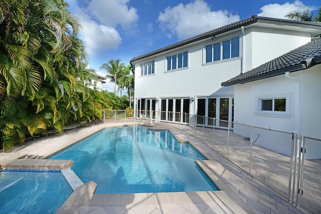 view of swimming pool with a patio area