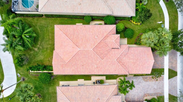 birds eye view of property featuring a residential view and a water view