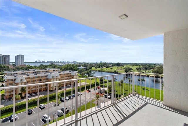 balcony featuring a water view