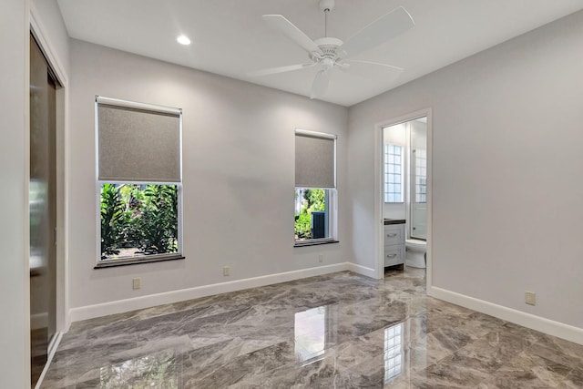 empty room featuring ceiling fan