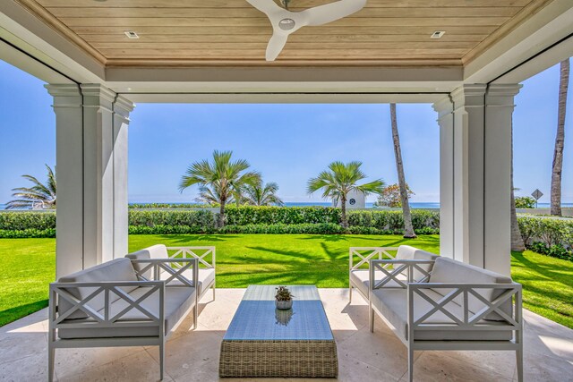 view of patio with an outdoor hangout area and a ceiling fan