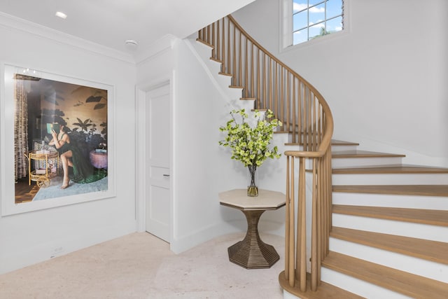 stairs featuring ornamental molding