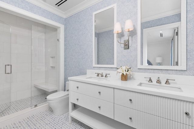 bathroom featuring tile patterned floors, toilet, crown molding, vanity, and an enclosed shower