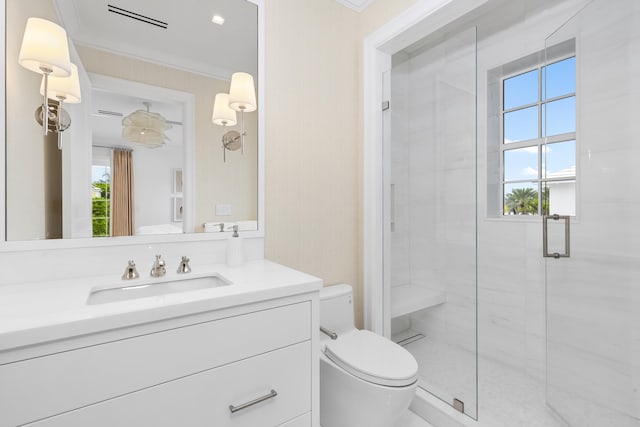 bathroom featuring a wealth of natural light, vanity, toilet, and walk in shower