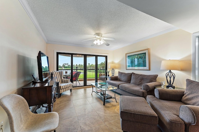 living room featuring ceiling fan, crown molding, a textured ceiling, and light tile patterned floors