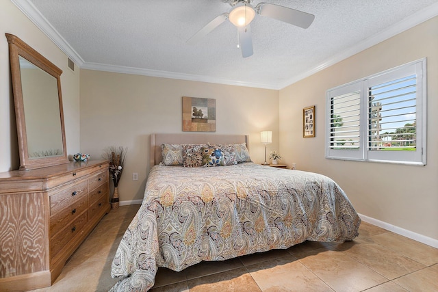 tiled bedroom featuring ornamental molding, a textured ceiling, and ceiling fan