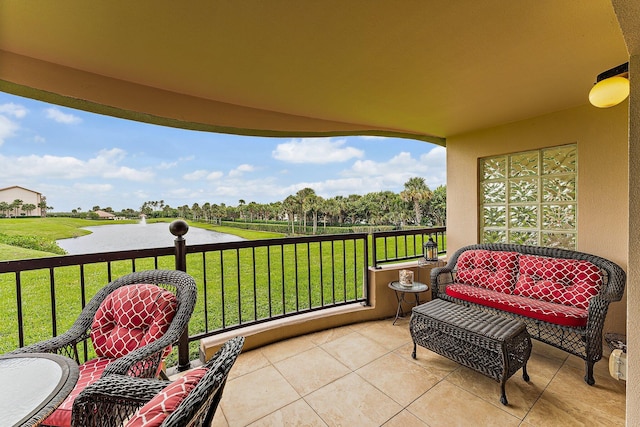 balcony featuring a water view