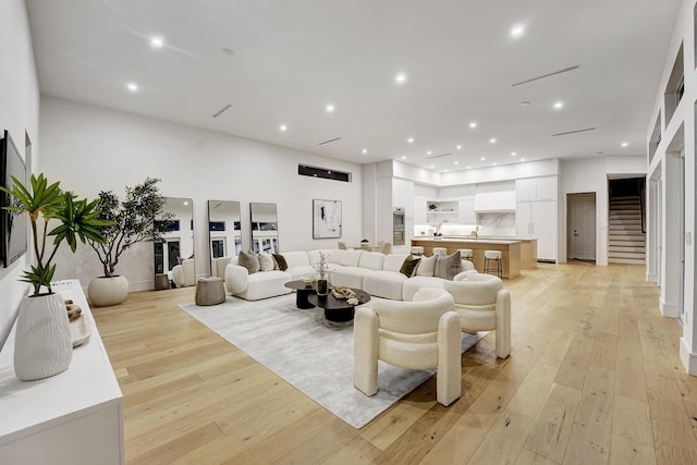 living room with light hardwood / wood-style floors