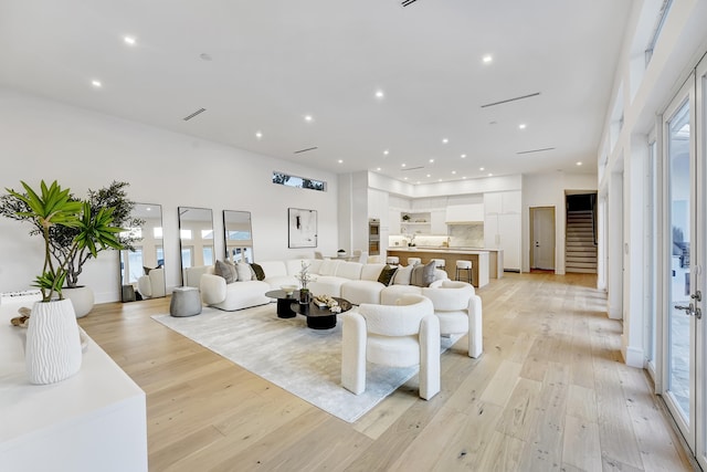 living room with light hardwood / wood-style floors