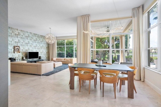 dining space featuring a notable chandelier