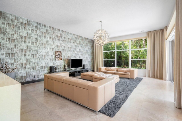 living room with an inviting chandelier