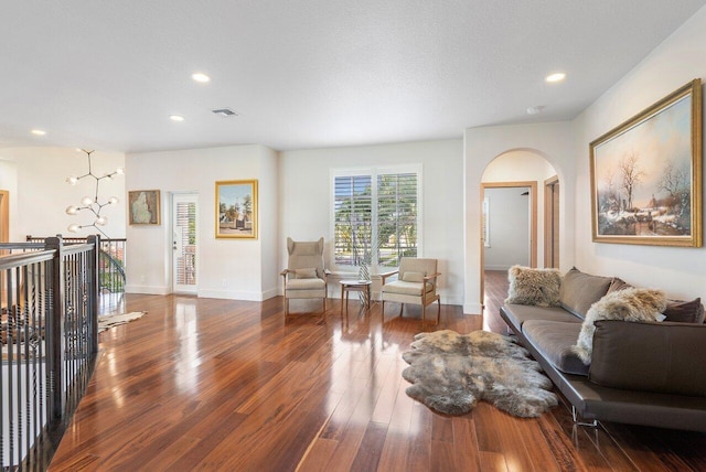 living room with dark wood-type flooring