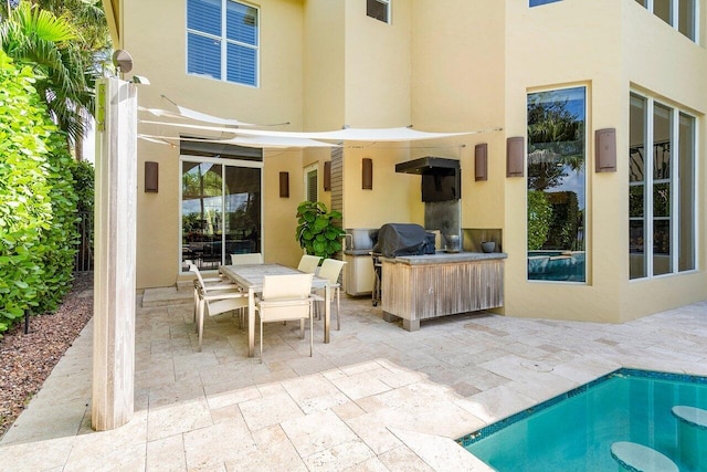 rear view of house with a patio area