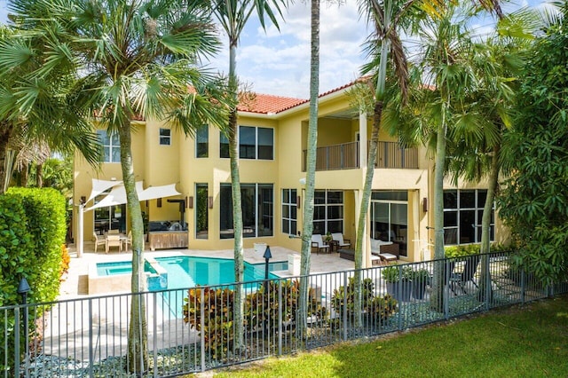 view of swimming pool with a patio area