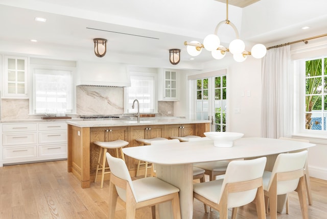 284 Monterey Rd, Palm Beach, FL 33480 - dining room featuring light wood finished floors, plenty of natural light, and recessed lighting