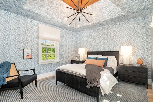 284 Monterey Rd, Palm Beach, FL 33480 - bedroom featuring a chandelier and baseboards
