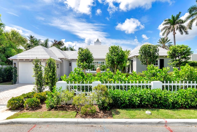 view of front of home with a garage