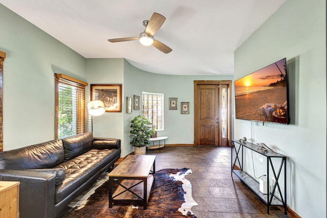 living room featuring ceiling fan