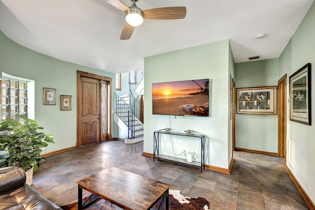 living room with ceiling fan