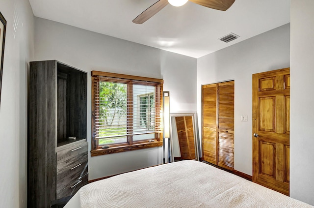 bedroom featuring a closet, ceiling fan, and carpet