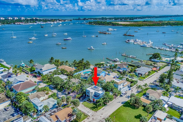 drone / aerial view with a water view