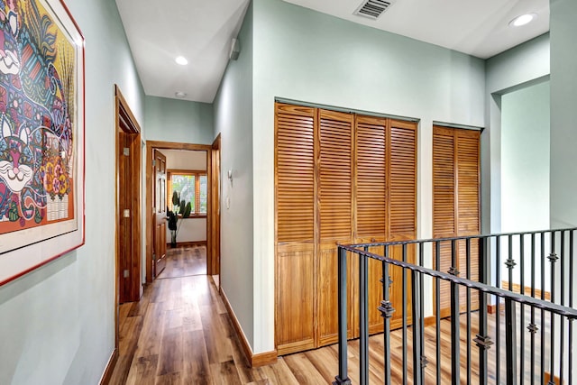 hallway featuring wood-type flooring