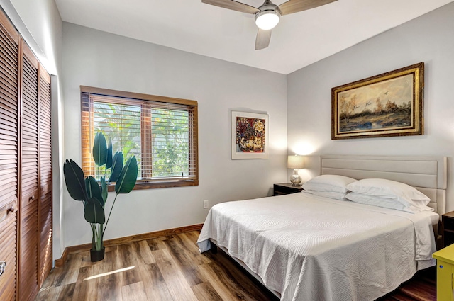 bedroom featuring a closet, ceiling fan, and wood-type flooring