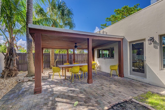 view of patio / terrace featuring ceiling fan