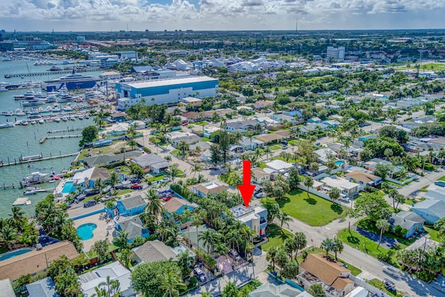 birds eye view of property featuring a water view