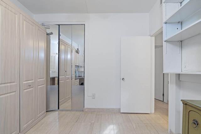 unfurnished bedroom with a closet