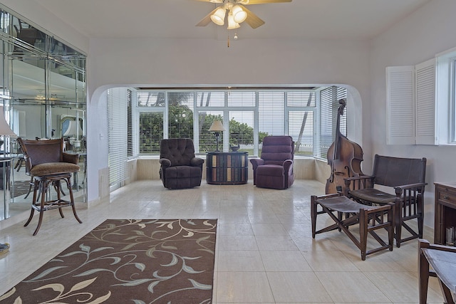 interior space featuring ceiling fan