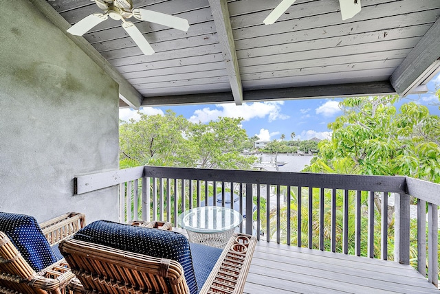 wooden terrace with ceiling fan