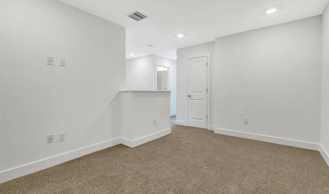 unfurnished room featuring carpet flooring