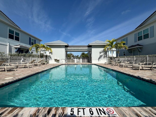 view of pool featuring a patio