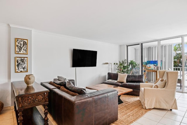 tiled living room featuring crown molding and a wall of windows