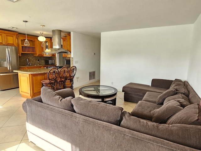 tiled living room with sink