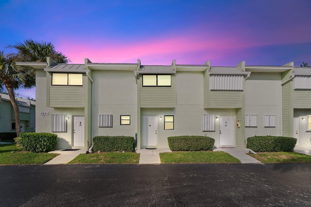 view of property with stucco siding