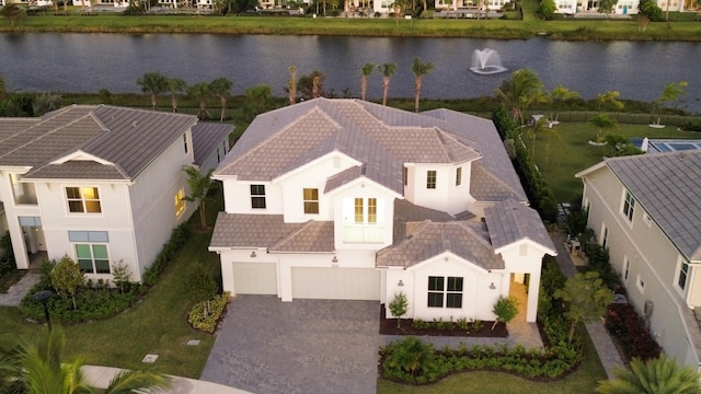 bird's eye view with a water view