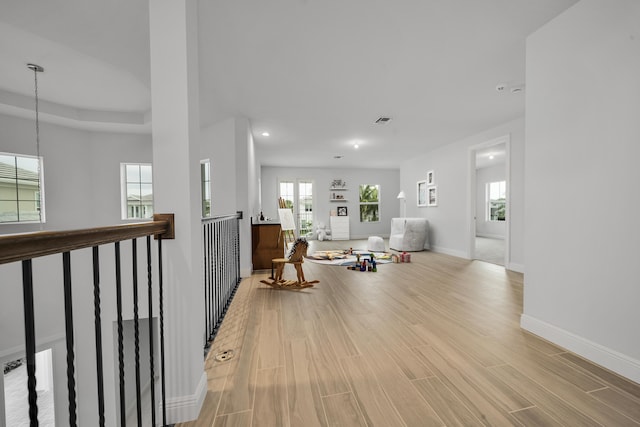 hallway featuring light hardwood / wood-style flooring