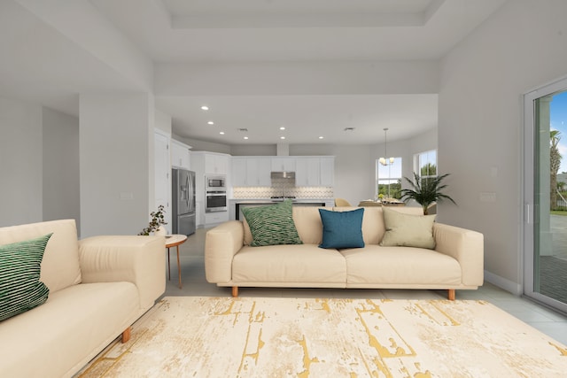 living room with an inviting chandelier