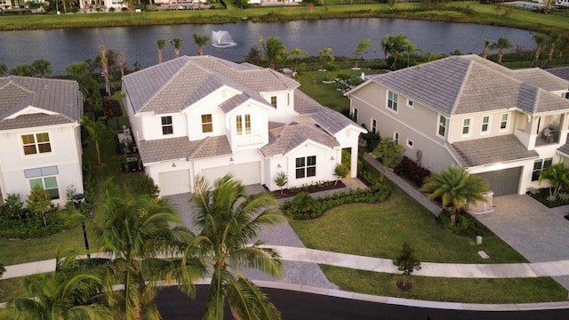 view of pool with a lawn